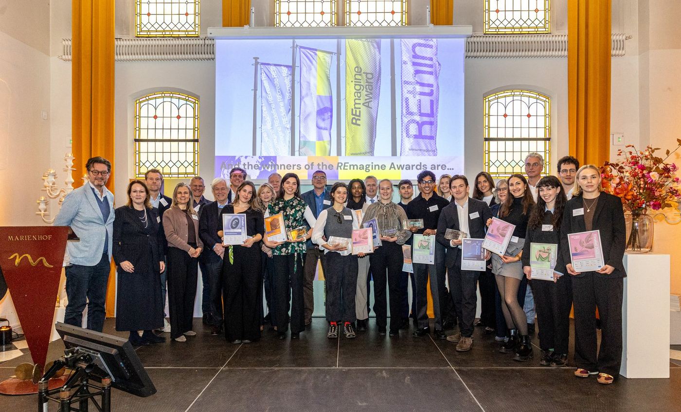 Finalists, jury members and organisers share the stage during the presentation of the REmagine Awards 2025